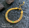 Gold Mesh Bracelet with Green Stone Accents
