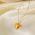 Gold Sculpted Heart Pendant Necklace